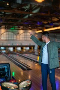 Bowling a strike first try at Bowl & Barrell Dallas